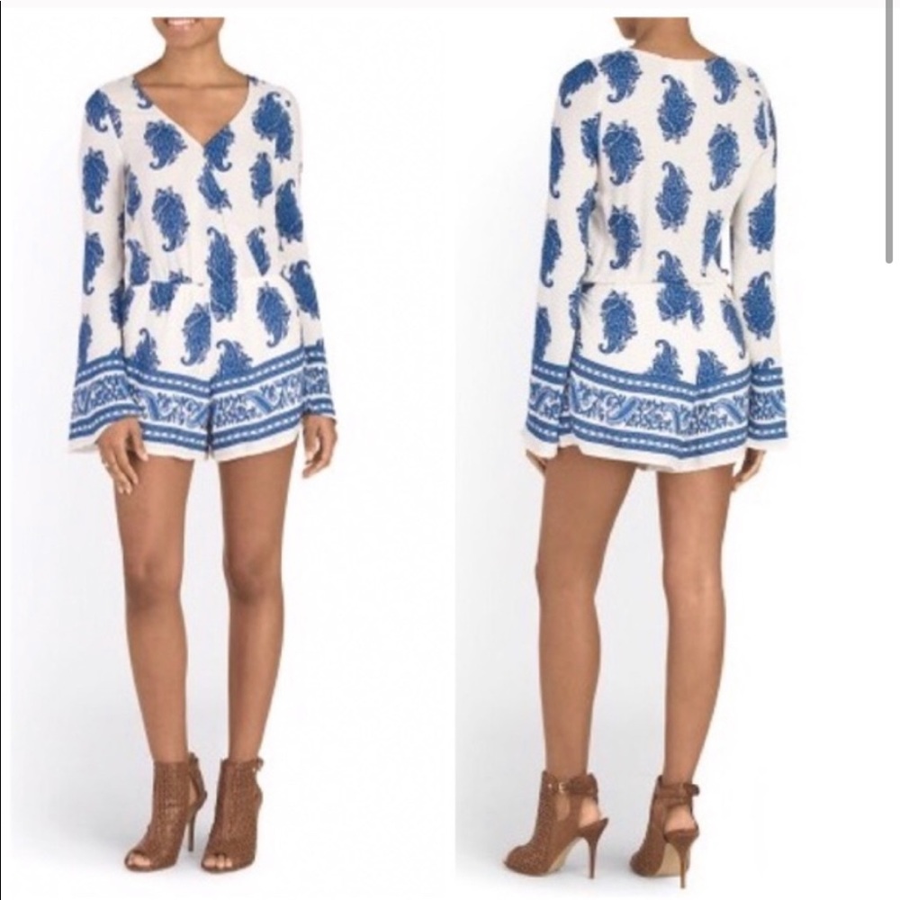 Blue and white romper with paisley print.